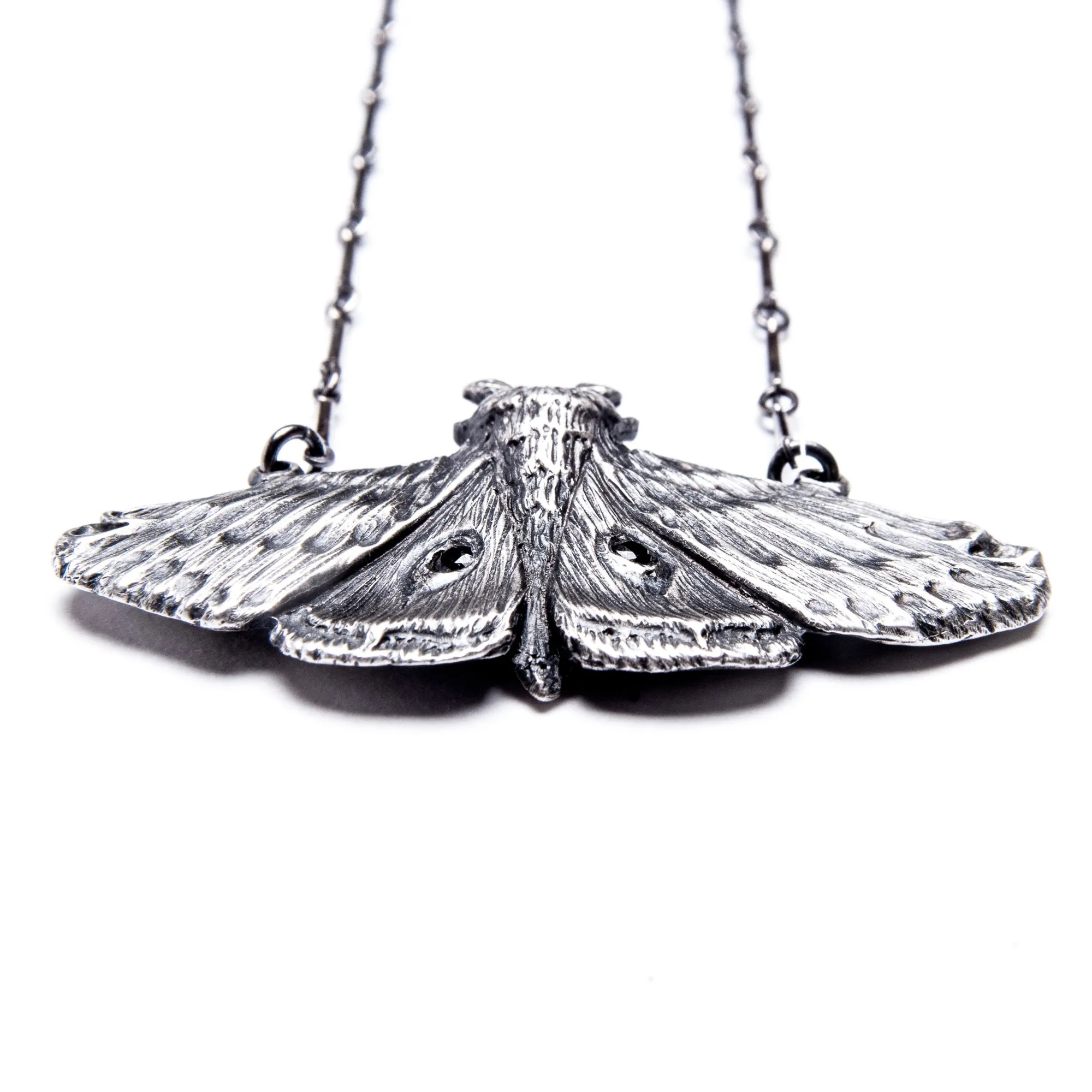 Planchette Moth Necklace with black czs.