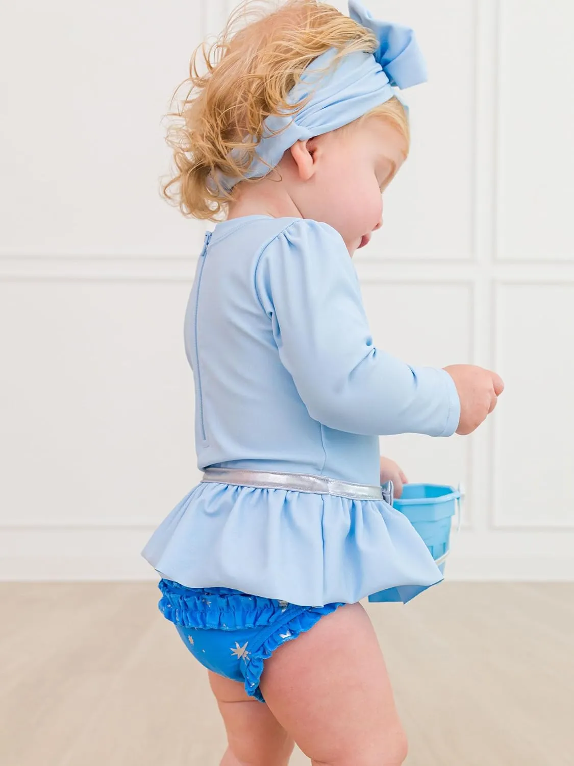 RuffleButts Baby Girls UPF50  Princess Long Sleeve Bow Skirted One Piece Swimsuit